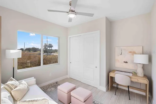 a living room with furniture and a window