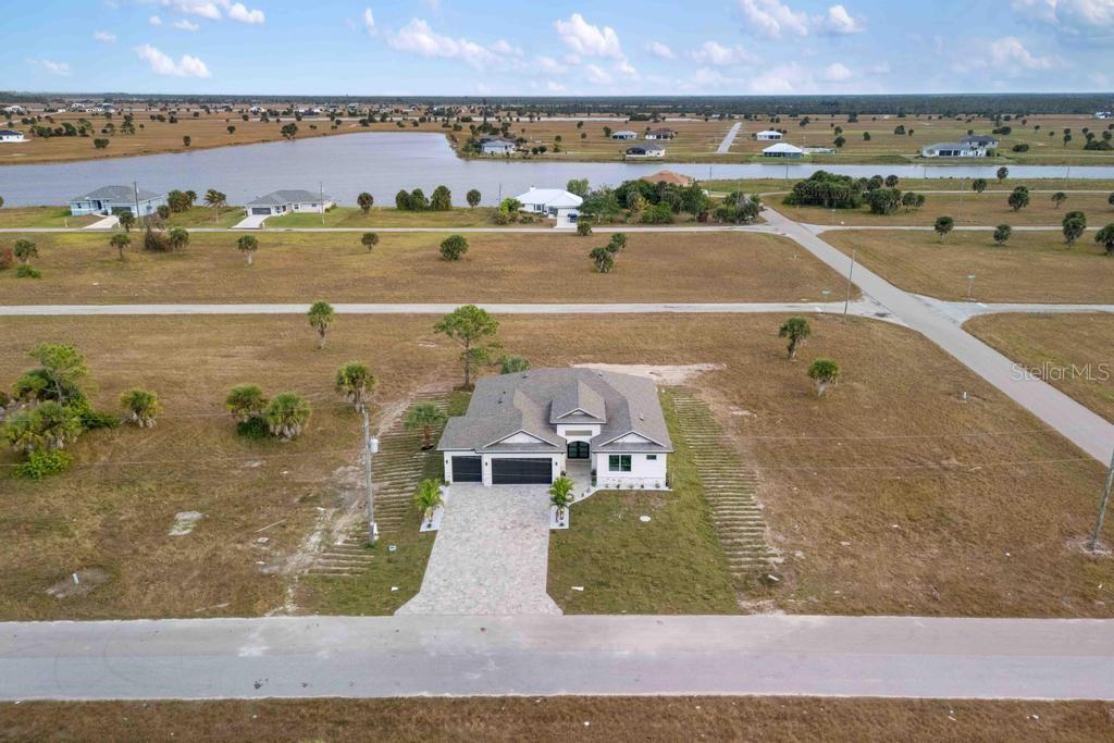 38 Lark Drive Placida, FL 33946 - Photo 46 of 46 an aerial view of residential houses with outdoor space and swimming pool