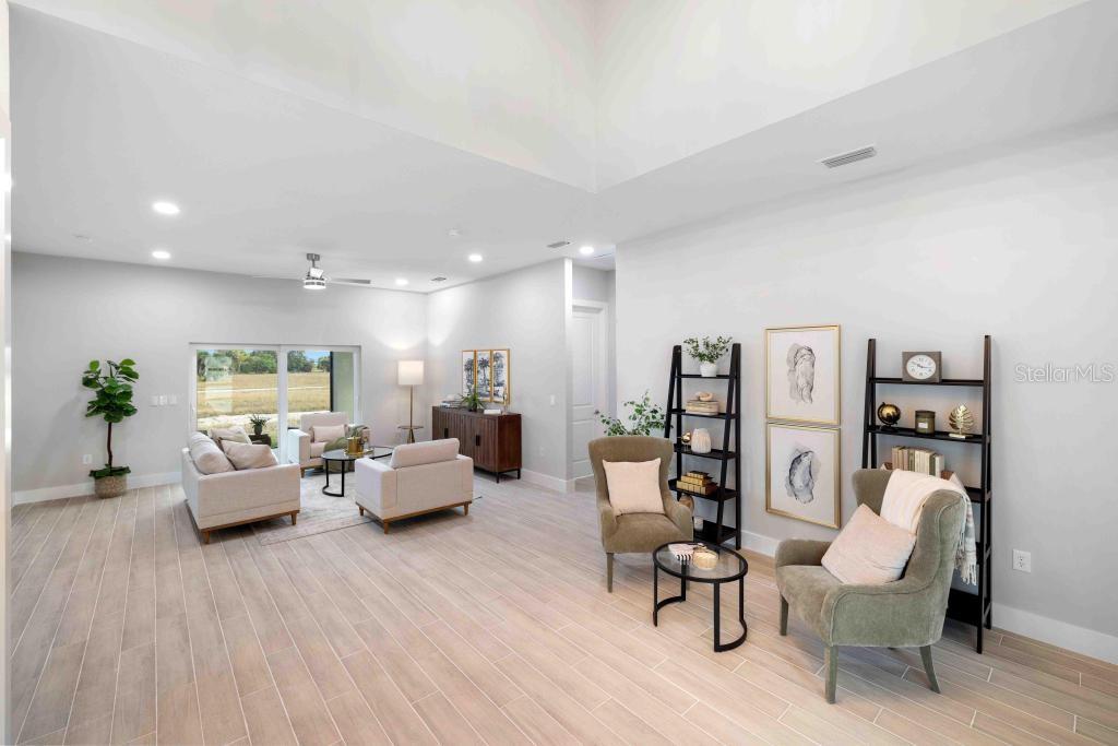 38 Lark Drive Placida, FL 33946 - Photo 5 of 46 a living room with furniture and white wooden floor