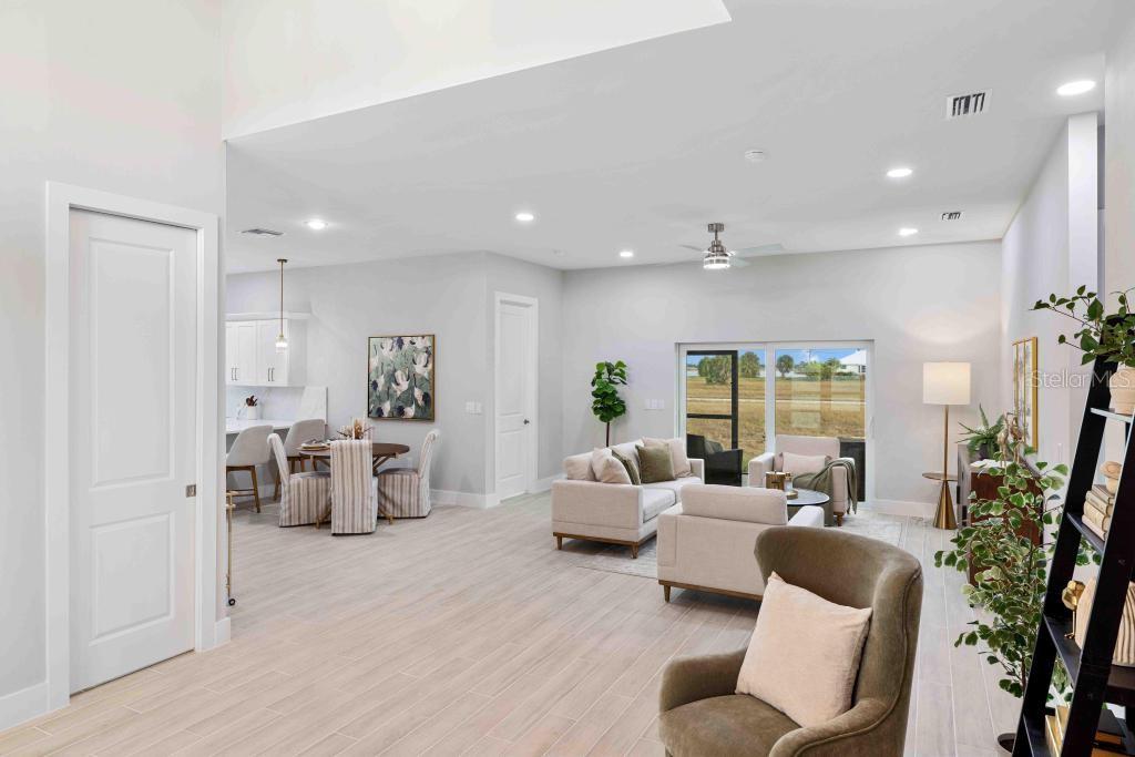 38 Lark Drive Placida, FL 33946 - Photo 6 of 46 a living room with furniture or couch and a large window