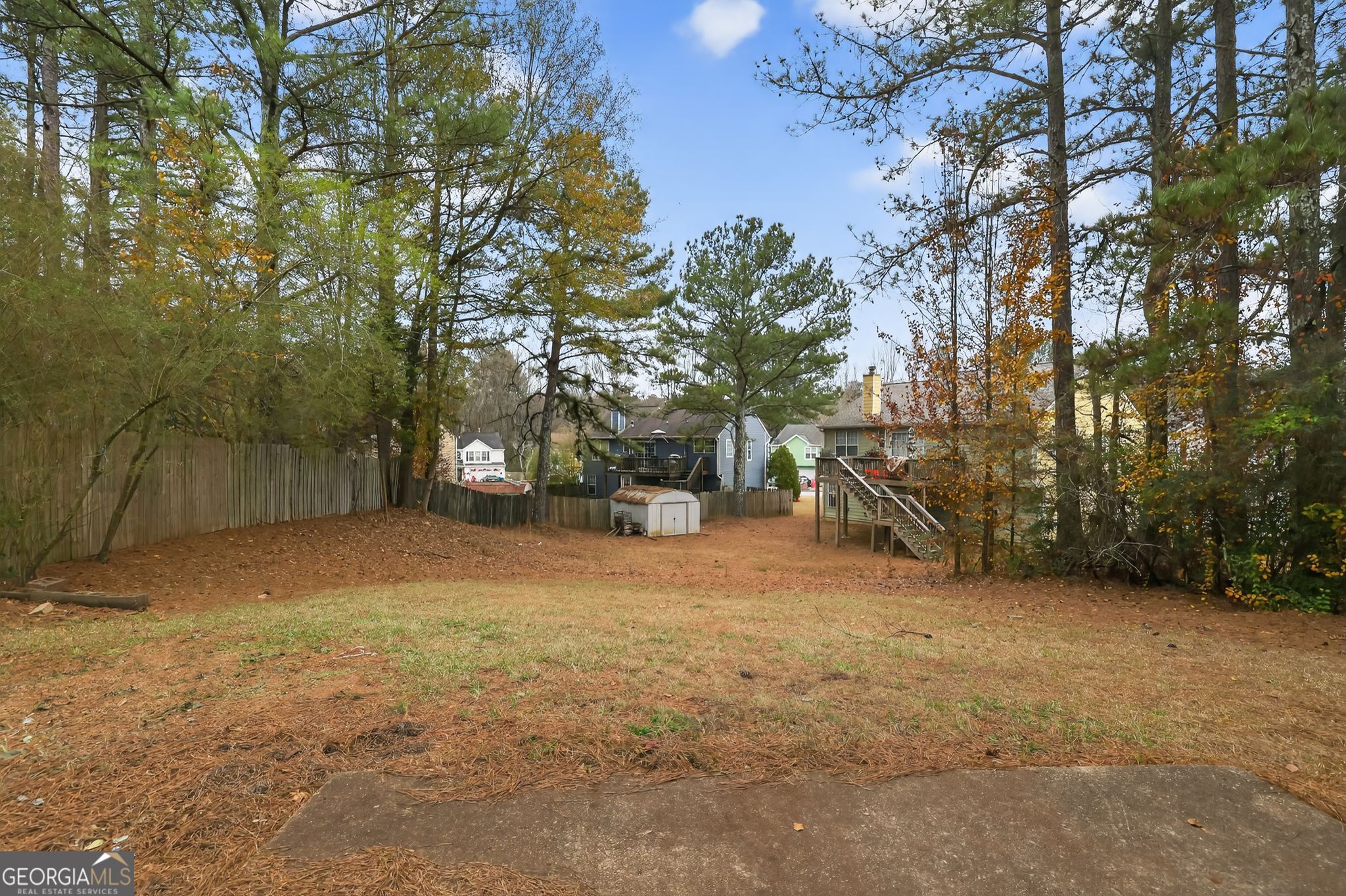 5635 Hunters Crossing Court Lithonia, GA 30038 - Photo 32 of 35 a view of a yard with a tree