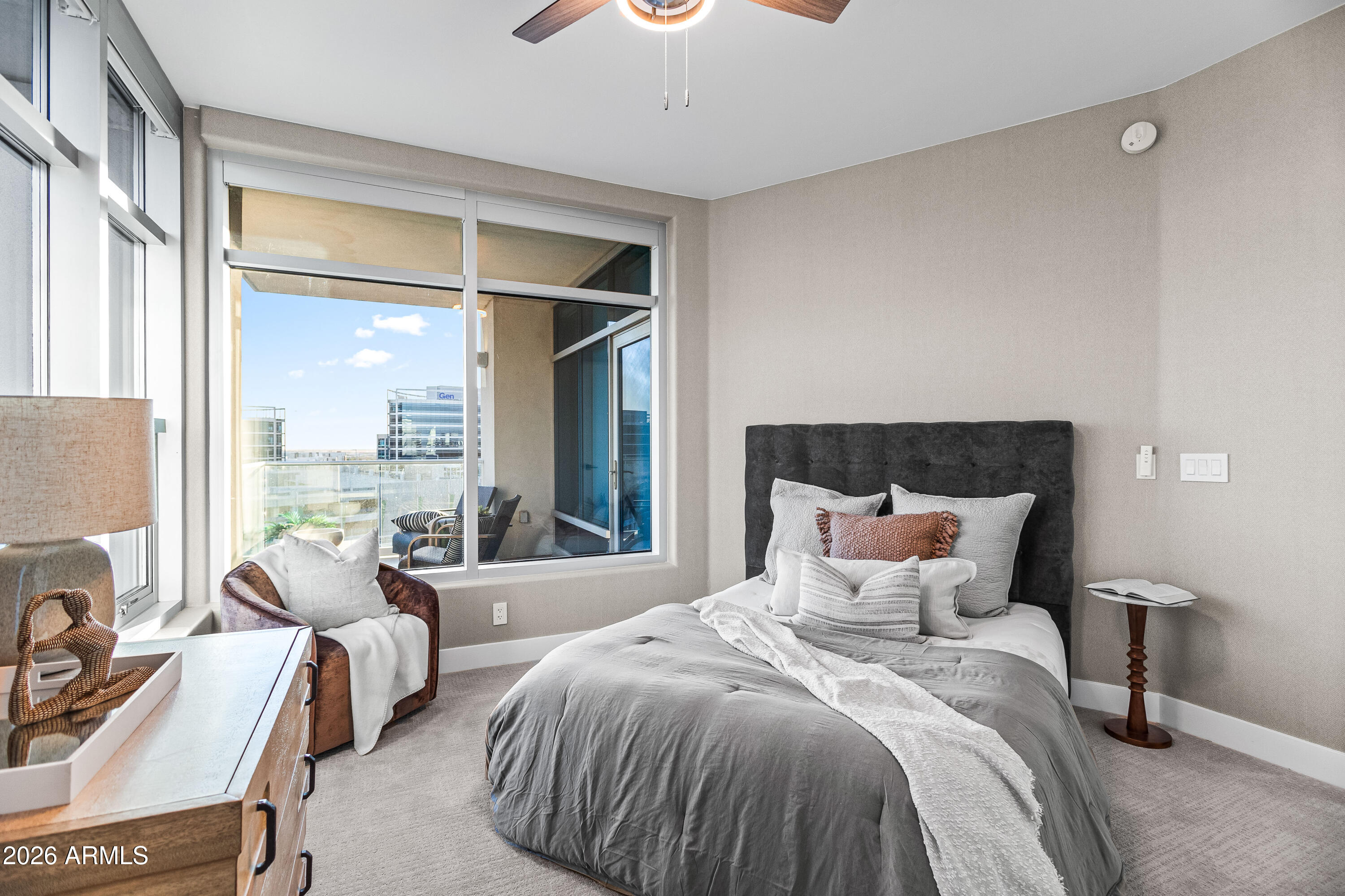 140 East Rio Salado Parkway, Unit 1101 Tempe, AZ 85281 - Photo 15 of 32 a bedroom with a bed and a large window