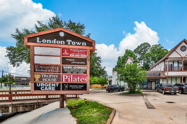 a sign on the side of a street