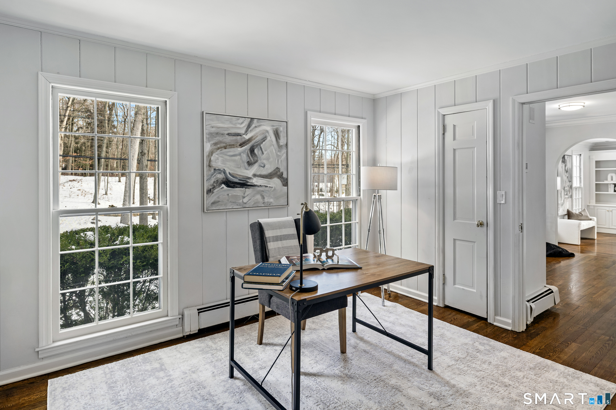 1038 West Road New Canaan, CT 06840 - Photo 18 of 37 a view of a livingroom with furniture and window