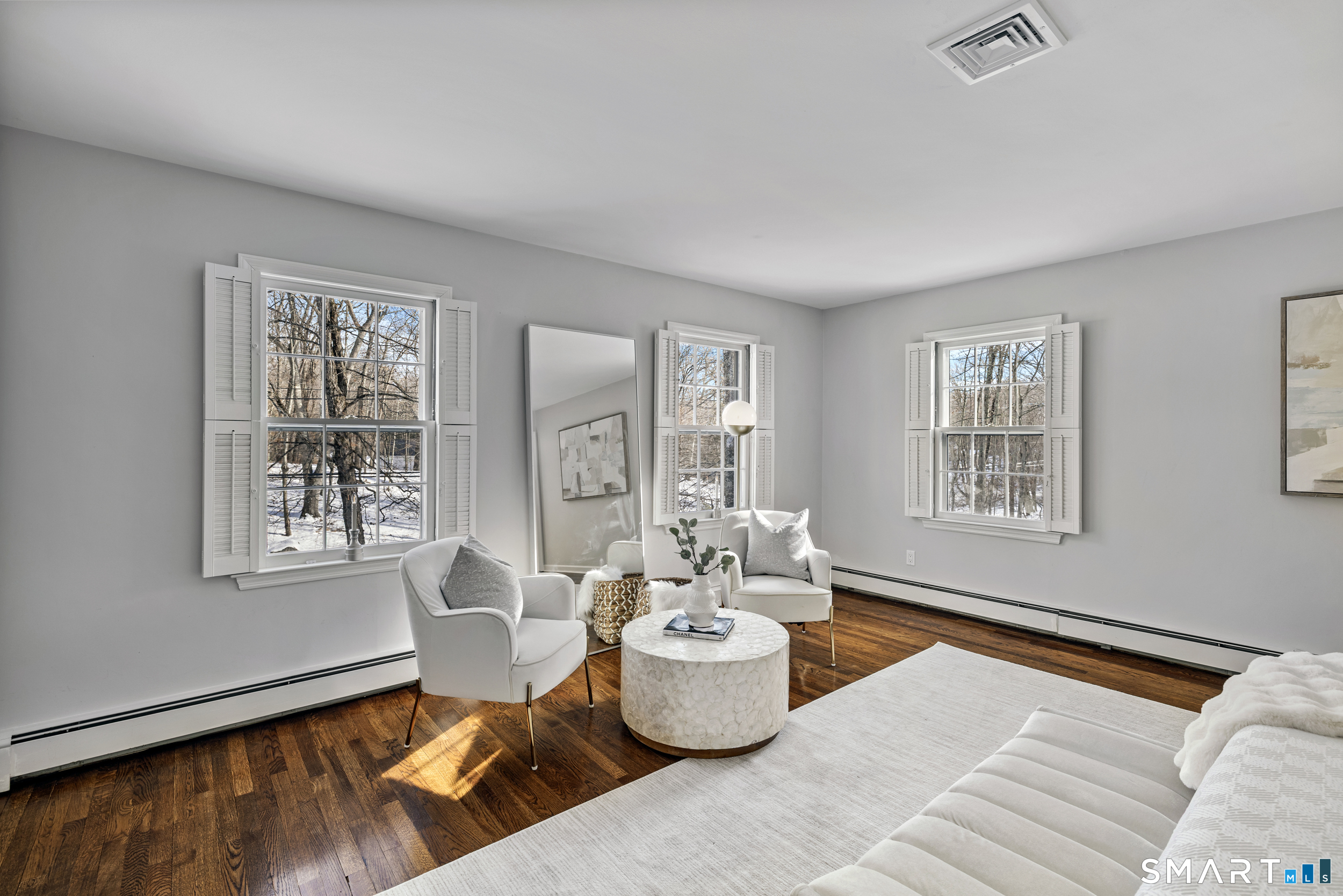 1038 West Road New Canaan, CT 06840 - Photo 24 of 37 a living room with furniture and window