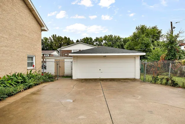 a view of a house with a garage