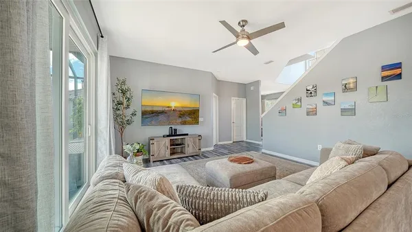 a large kitchen with a table and chairs