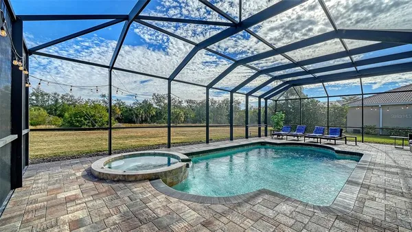 a view of a golf course with a swimming pool