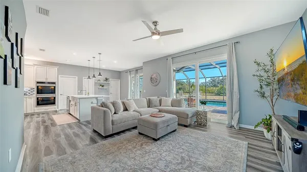 a living room with furniture and a window