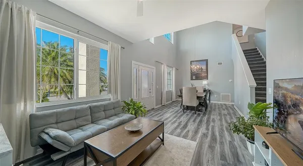 a living room with furniture and a window