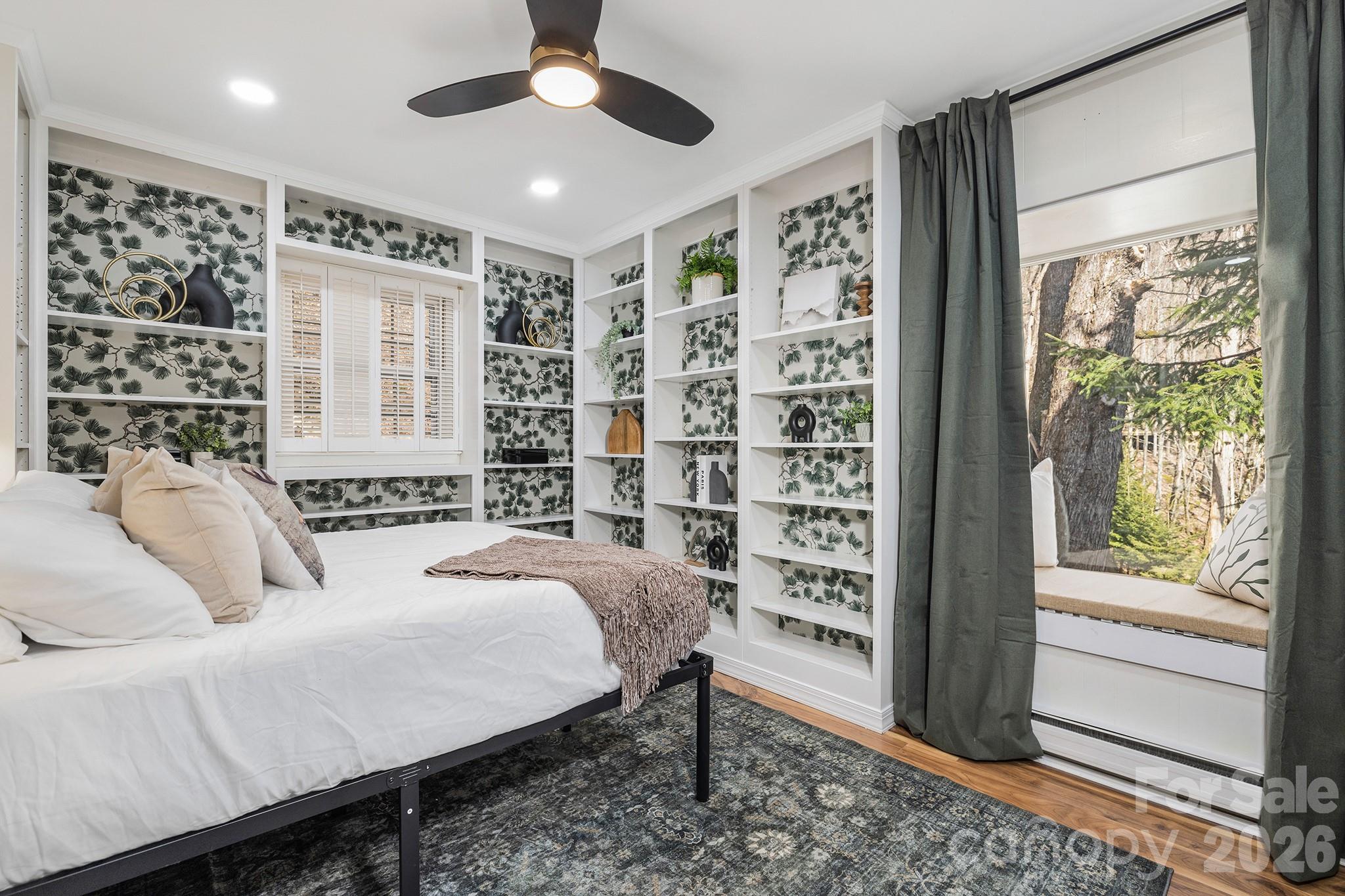 556-558 Thorncliff Drive Seven Devils, NC 28604 - Photo 15 of 48 a bedroom with a large bed and a window