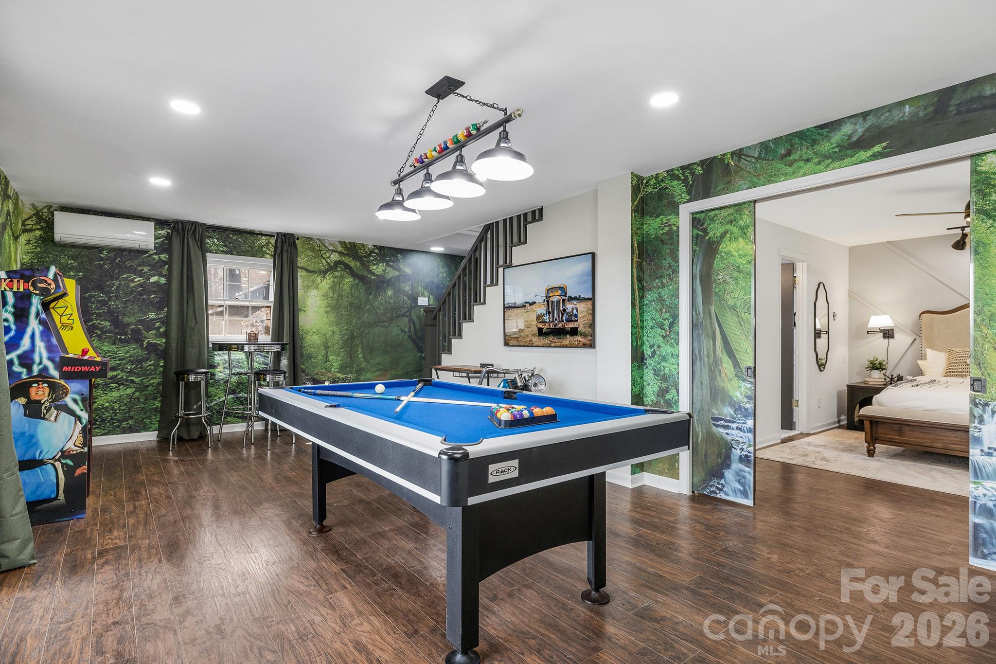 556-558 Thorncliff Drive Seven Devils, NC 28604 - Photo 19 of 48 a room with furniture pool table wooden floor and windows