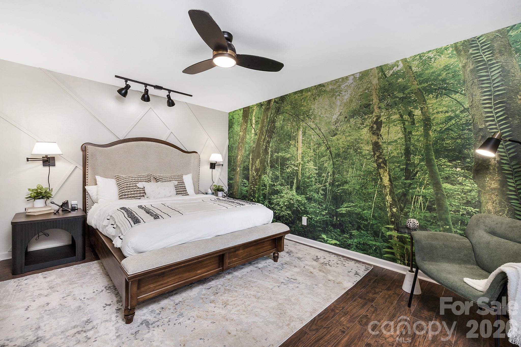 556-558 Thorncliff Drive Seven Devils, NC 28604 - Photo 22 of 48 a bedroom with a bed a couch and a window