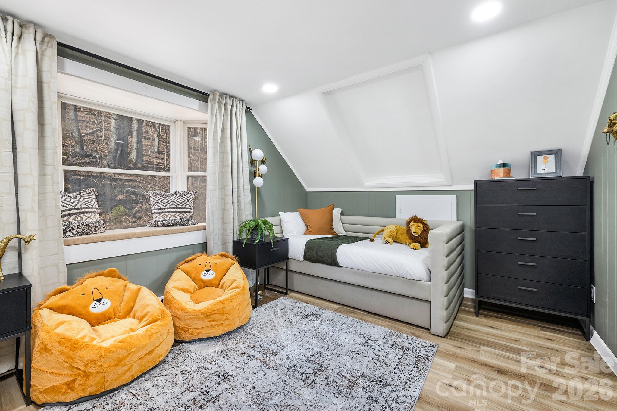 556-558 Thorncliff Drive Seven Devils, NC 28604 - Photo 25 of 48 a living room with furniture and a large window