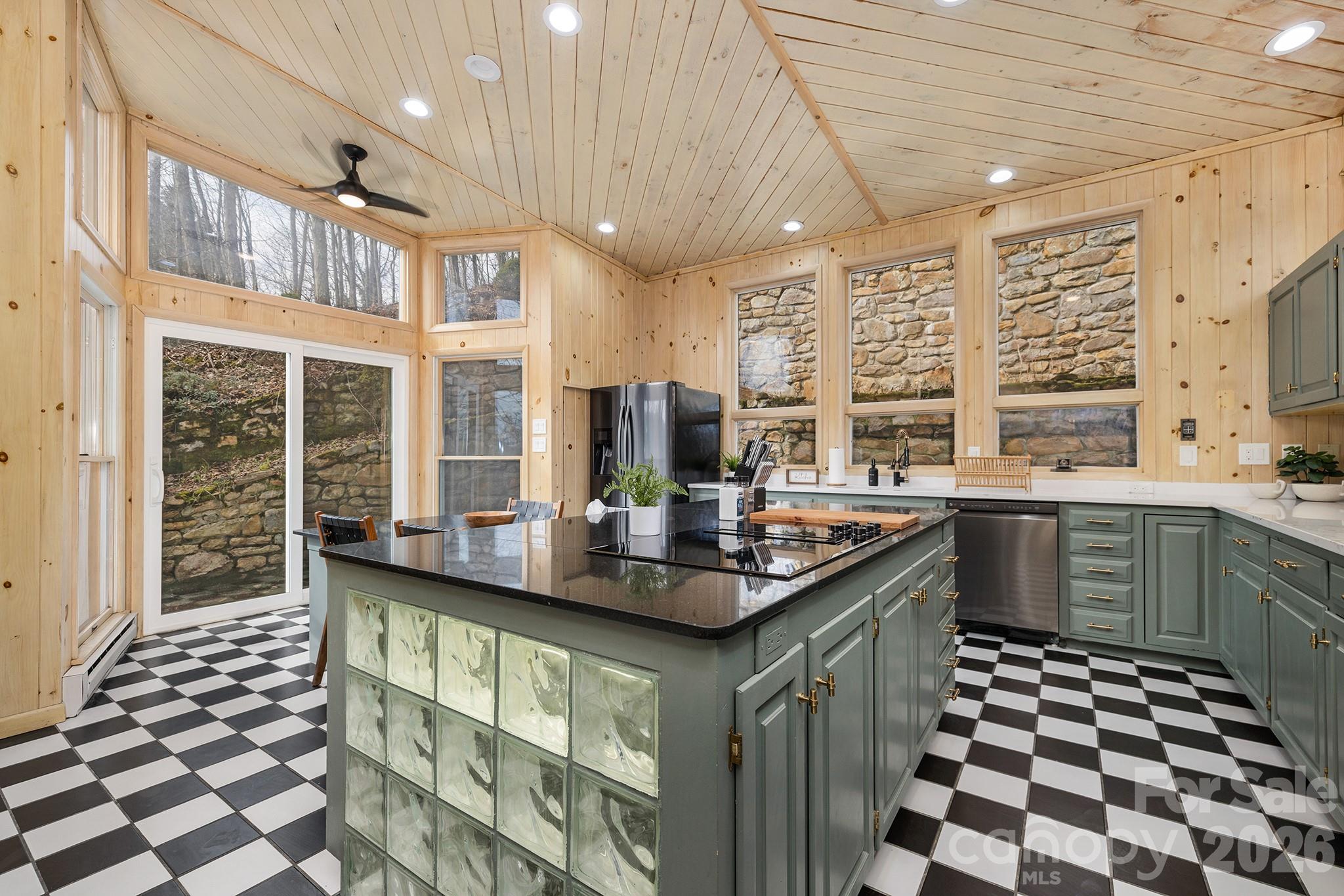 556-558 Thorncliff Drive Seven Devils, NC 28604 - Photo 28 of 48 a kitchen with a sink and a stove
