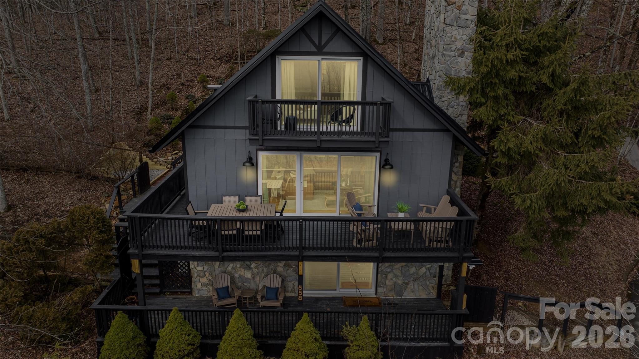 556-558 Thorncliff Drive Seven Devils, NC 28604 - Photo 33 of 48 a front view of a house with balcony
