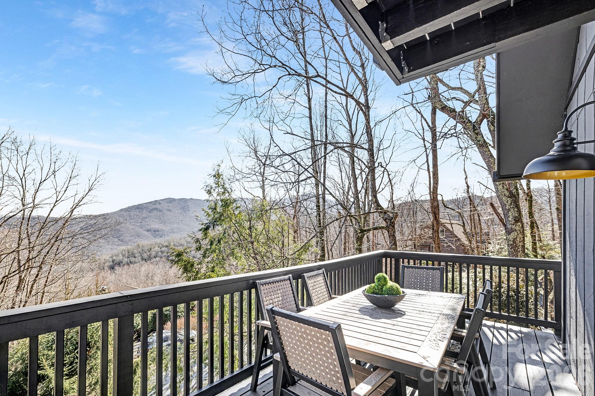556-558 Thorncliff Drive Seven Devils, NC 28604 - Photo 35 of 48 a view of a balcony with furniture