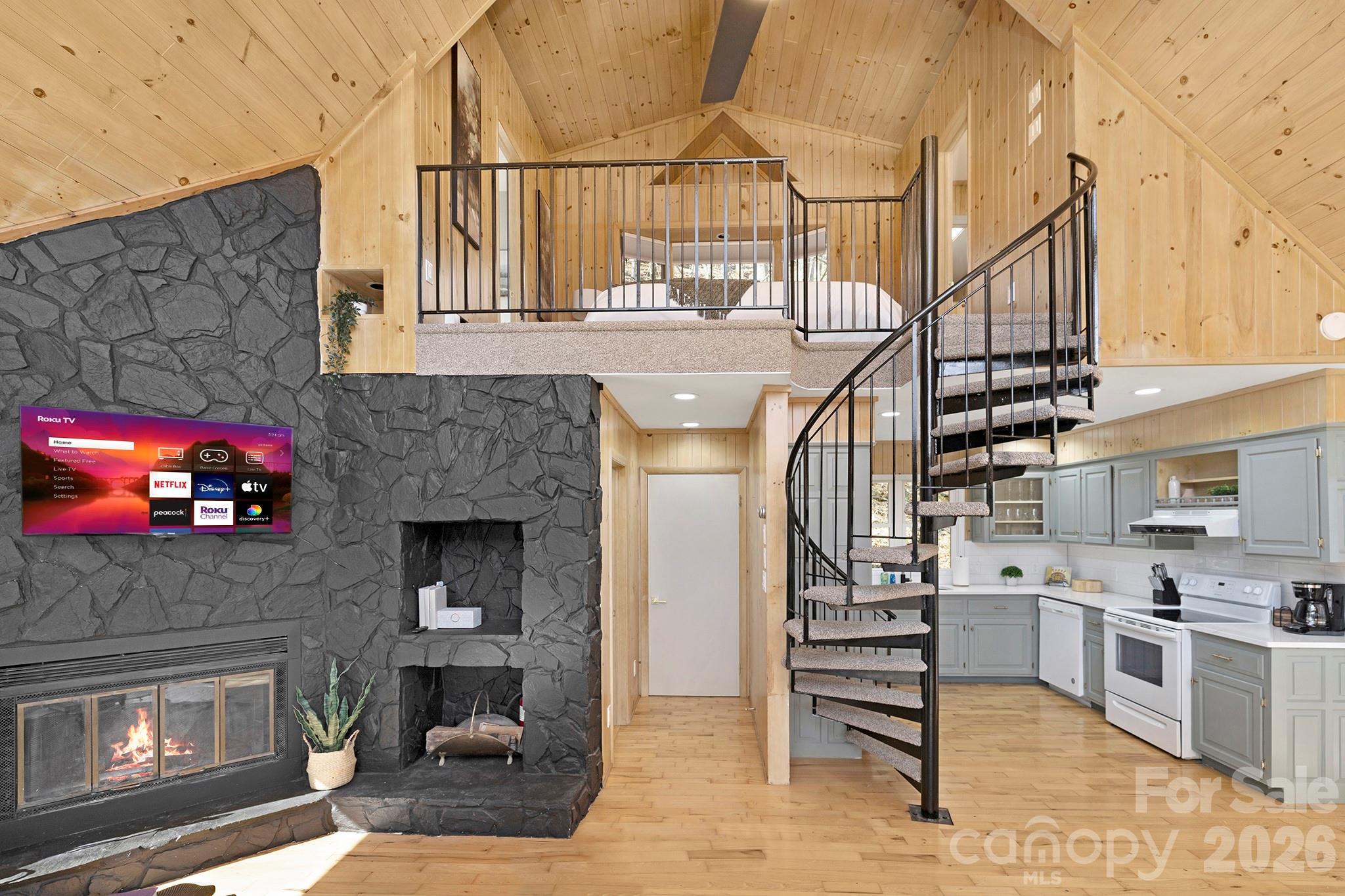 556-558 Thorncliff Drive Seven Devils, NC 28604 - Photo 41 of 48 a kitchen with furniture and a fireplace