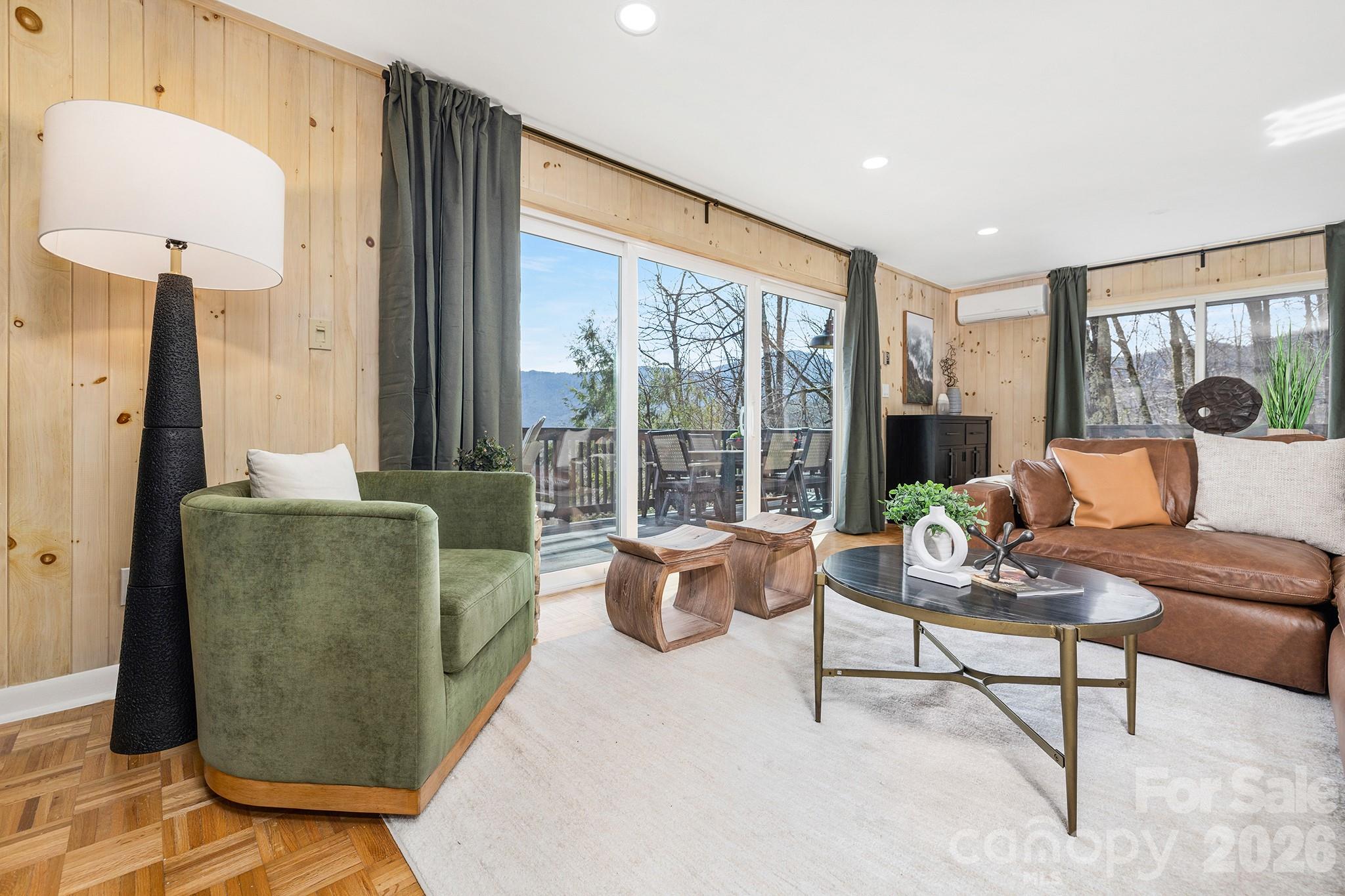 556-558 Thorncliff Drive Seven Devils, NC 28604 - Photo 5 of 48 a living room with furniture and a large window