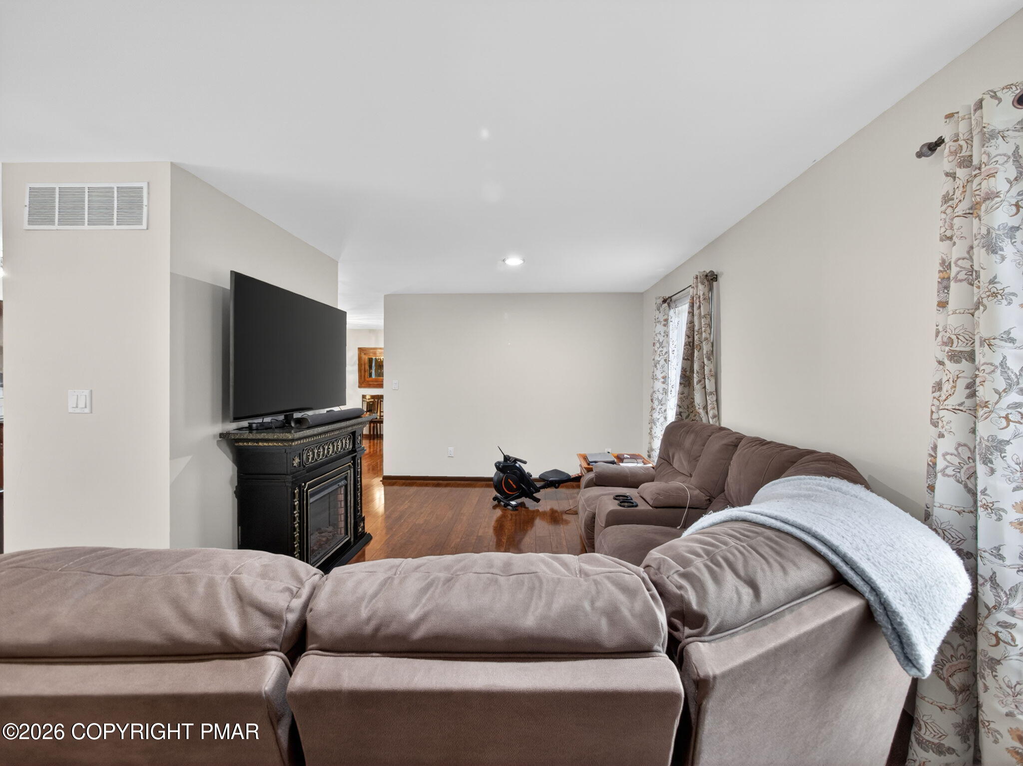 363 Blue Ridge Road Saylorsburg, PA 18353 - Photo 20 of 61 a living room with furniture and a flat screen tv