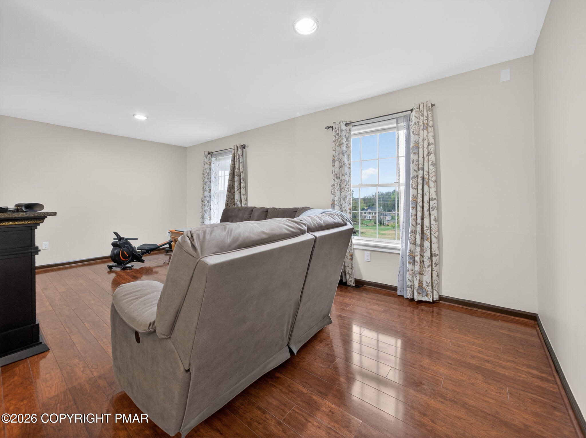 363 Blue Ridge Road Saylorsburg, PA 18353 - Photo 21 of 61 a living room with furniture and a wooden floor