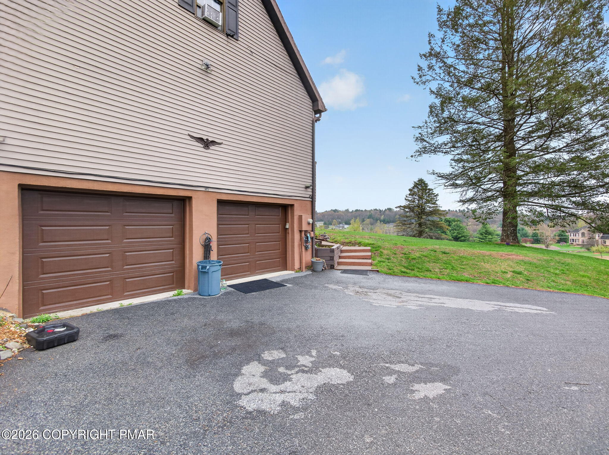 363 Blue Ridge Road Saylorsburg, PA 18353 - Photo 57 of 61 a view of a house with a yard and garage