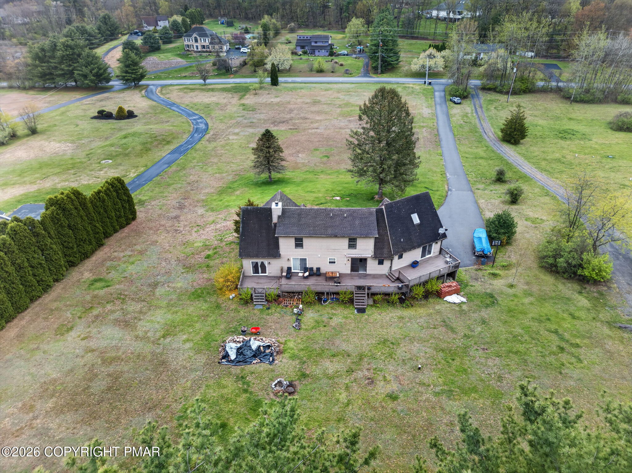 363 Blue Ridge Road Saylorsburg, PA 18353 - Photo 58 of 61 an aerial view of a house with outdoor space swimming pool and mountains