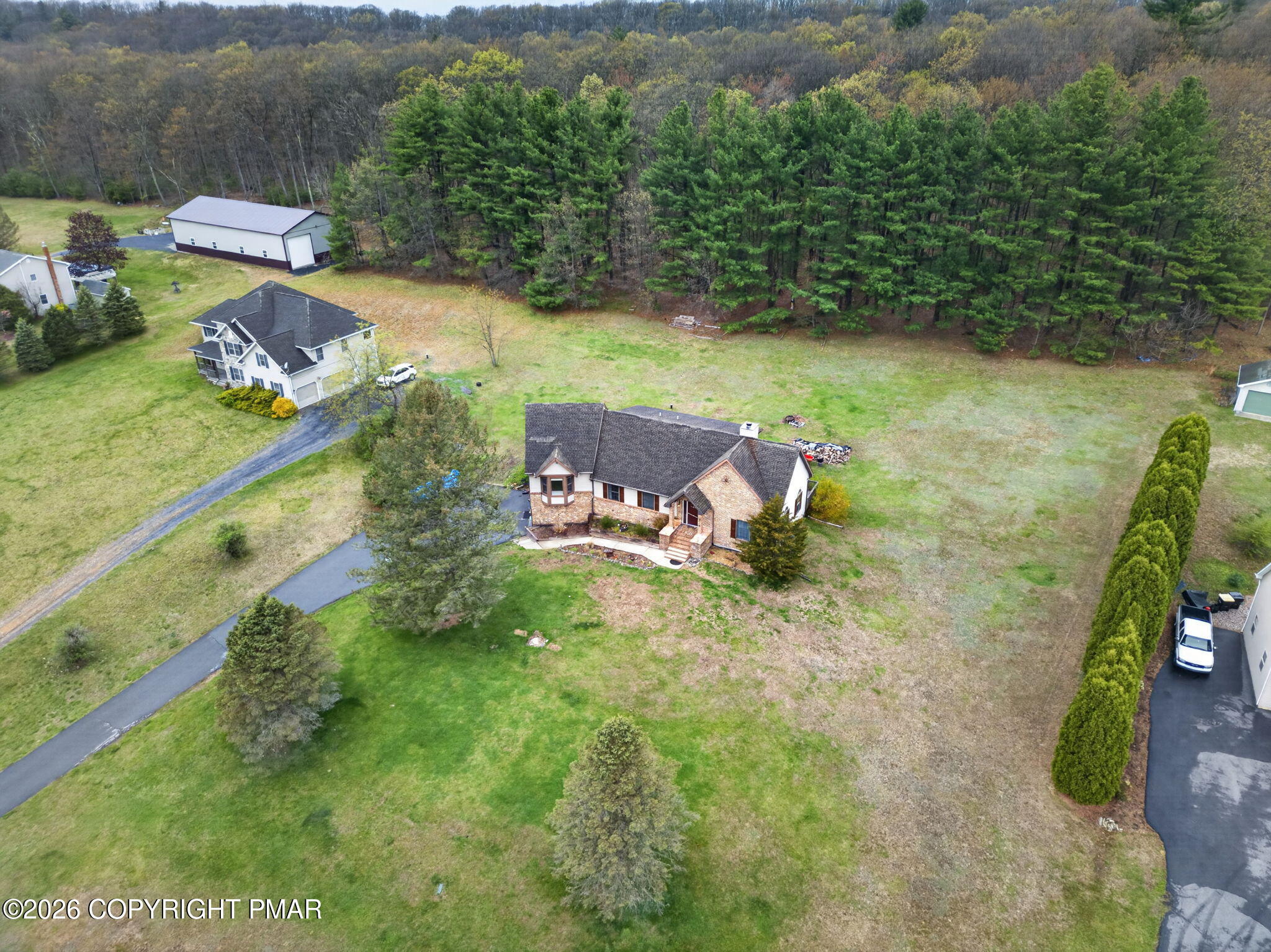 363 Blue Ridge Road Saylorsburg, PA 18353 - Photo 61 of 61 an aerial view of a house with yard swimming pool and outdoor seating