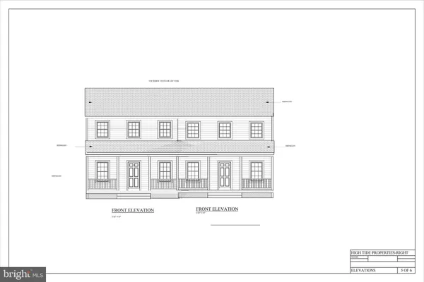 a black and white photo of a living room