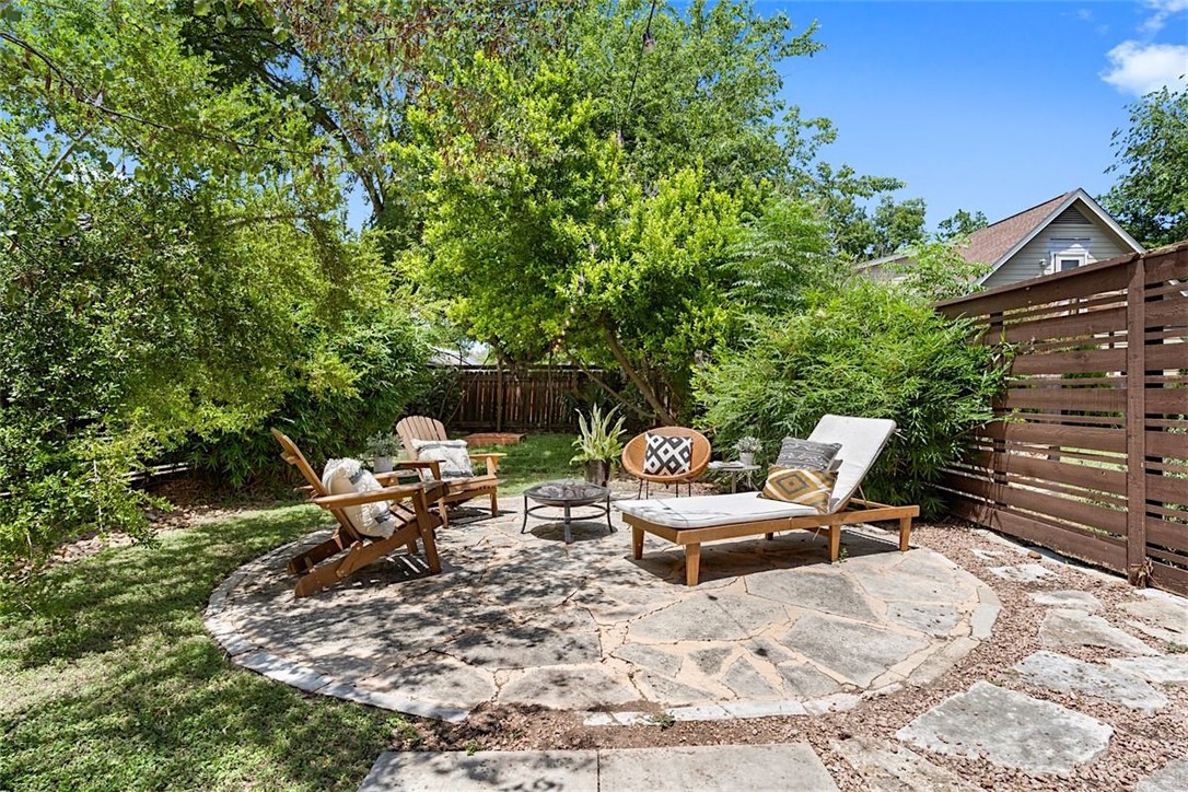 Welcome to your own backyard! This private space is an inviting and relaxing respite from a busy day.