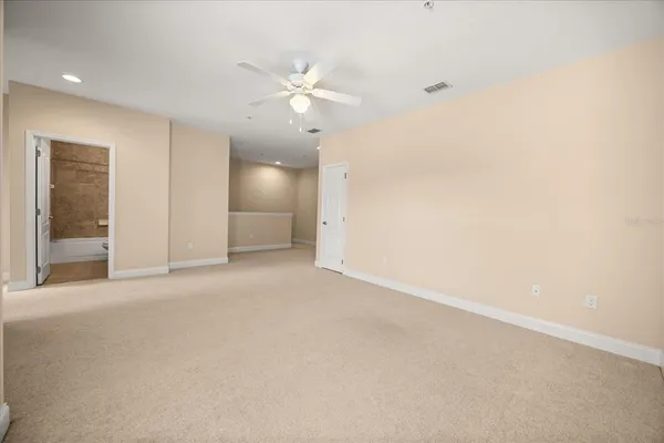 an empty room with a bathroom