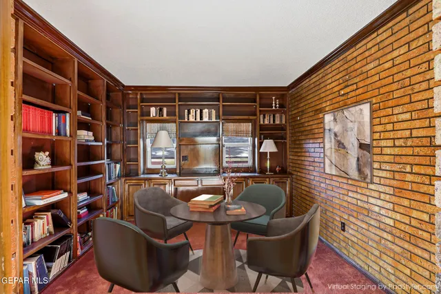 a bathroom with a granite countertop sink a toilet and a mirror