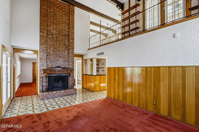 a view of a hallway with white walls