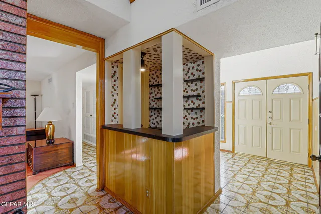 a bathroom with a sink double vanity and a mirror