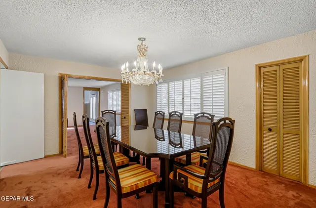 a view of a backyard of the house