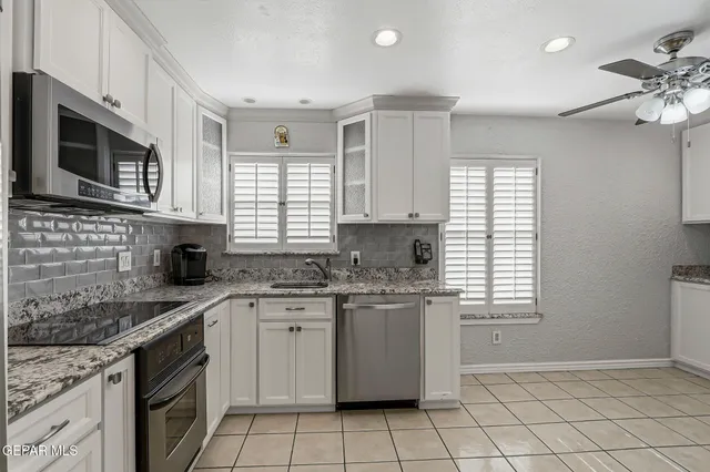 a view of a street with an outdoor seating