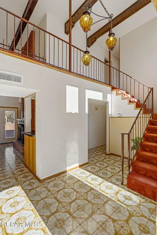 a room with furniture and window