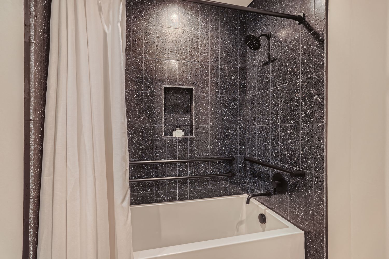 48 East Avenue, Unit 1706 Austin, TX 78701 - Photo 8 of 12 a bathroom with a bathtub