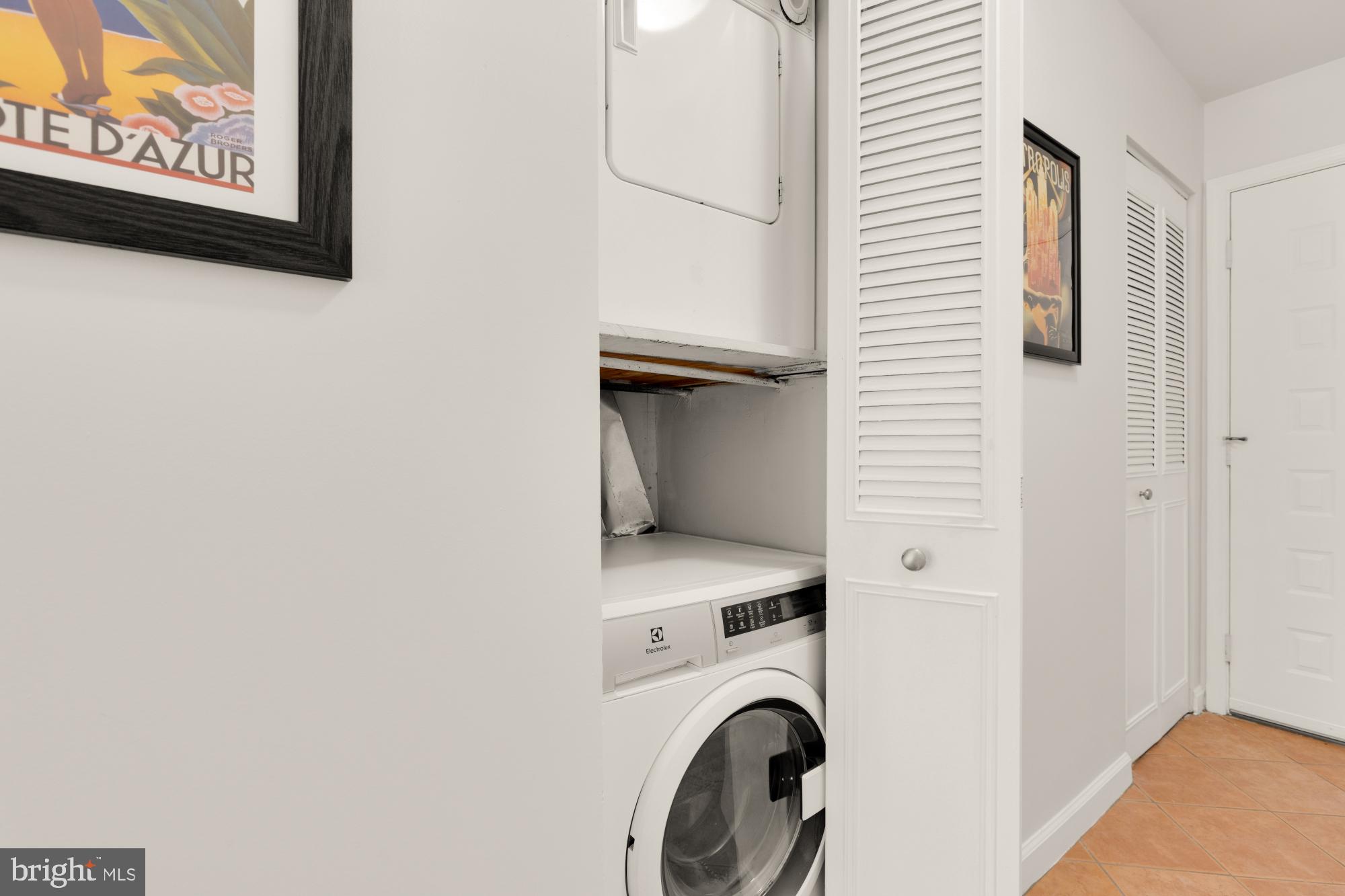 2000 16th Street Northwest, Unit 6 Washington, DC 20009 - Photo 16 of 37 a utility room with dryer and washer