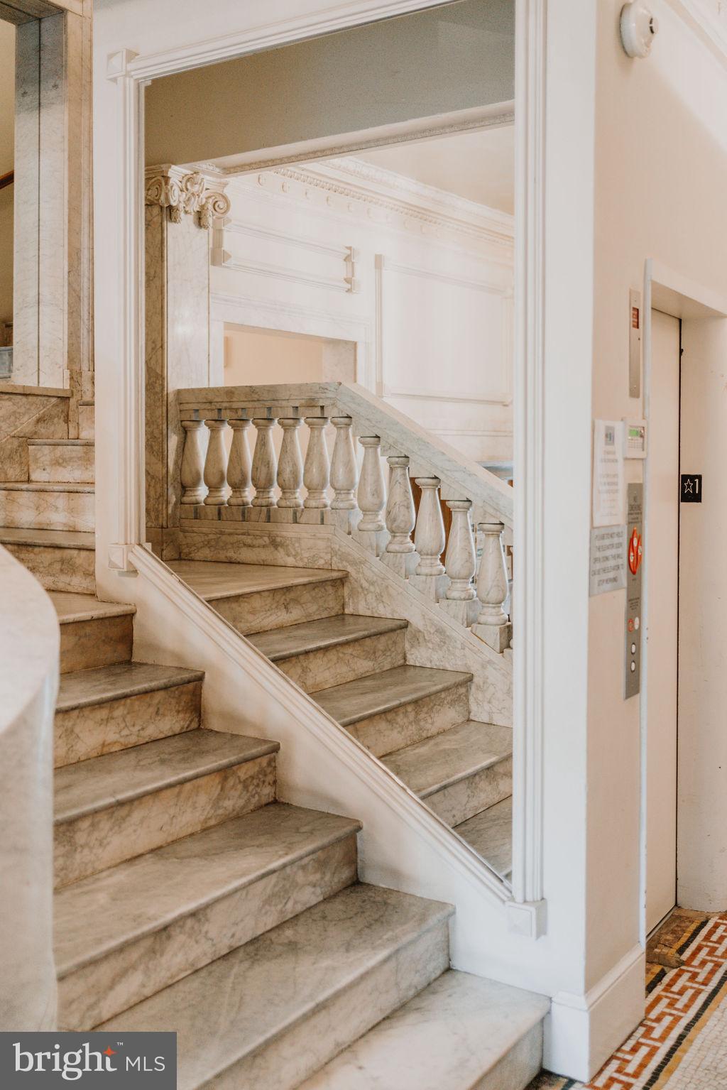2000 16th Street Northwest, Unit 6 Washington, DC 20009 - Photo 7 of 37 a view of staircase with white walls and windows
