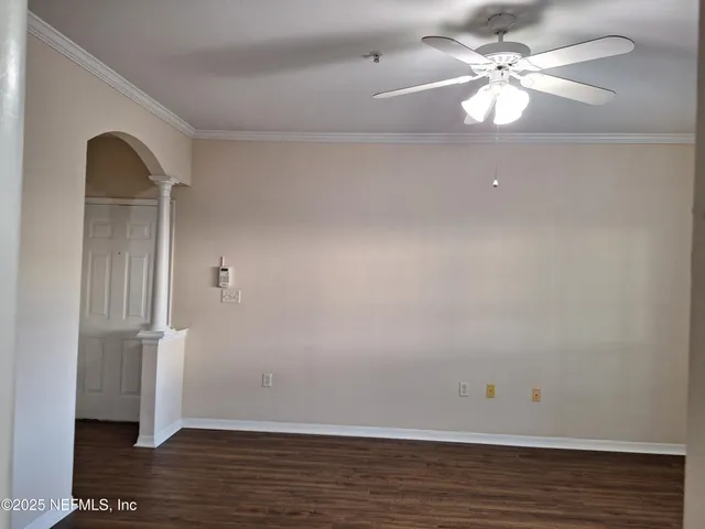 a view of a room with a large window