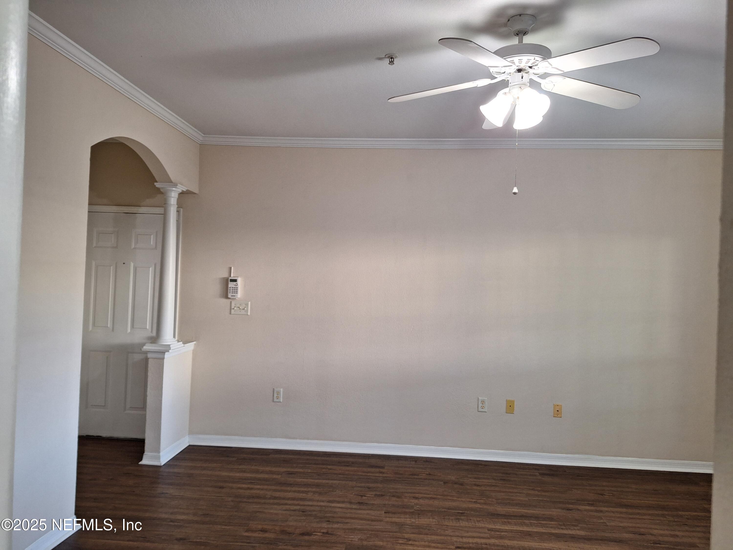 7800 Point Meadows Drive, Unit 116 Jacksonville, FL 32256 - Photo 15 of 29 wooden floor in an empty room