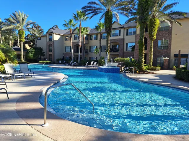 a view of outdoor space yard and swimming pool