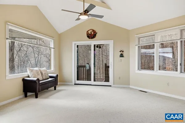a view of livingroom with furniture and windows