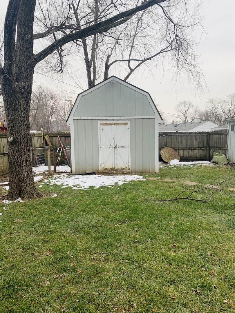 23 Surrey Road Montgomery, IL 60538 - Photo 20 of 22 a view of a house with a yard