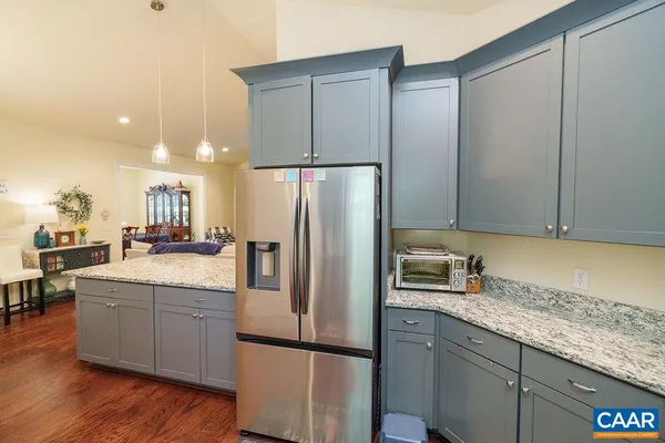 a living room with furniture and a windows