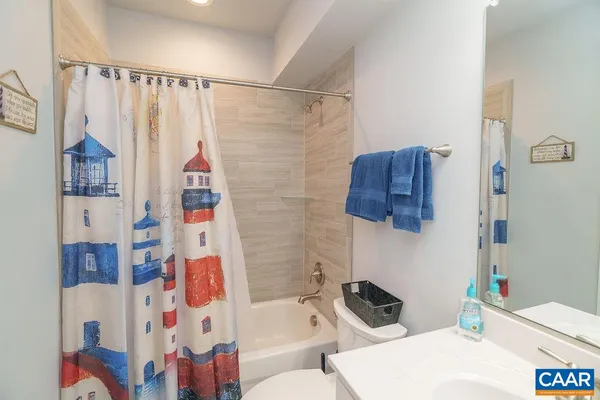 a view of a two chairs in the balcony