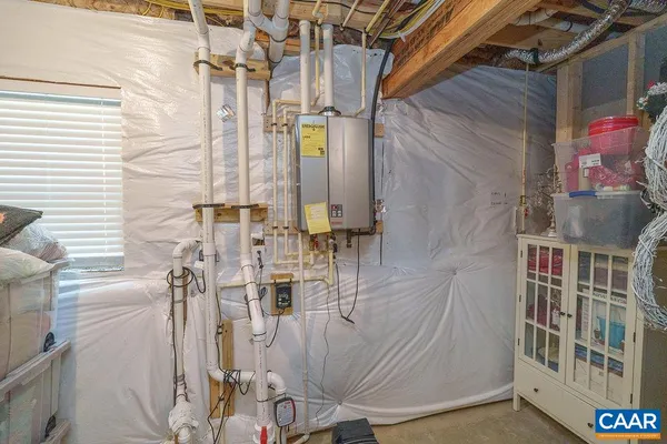 a view of balcony with furniture and wooden deck