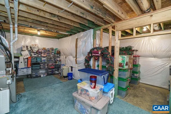 a view of a wooden deck with a yard