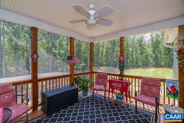 a view of house with yard